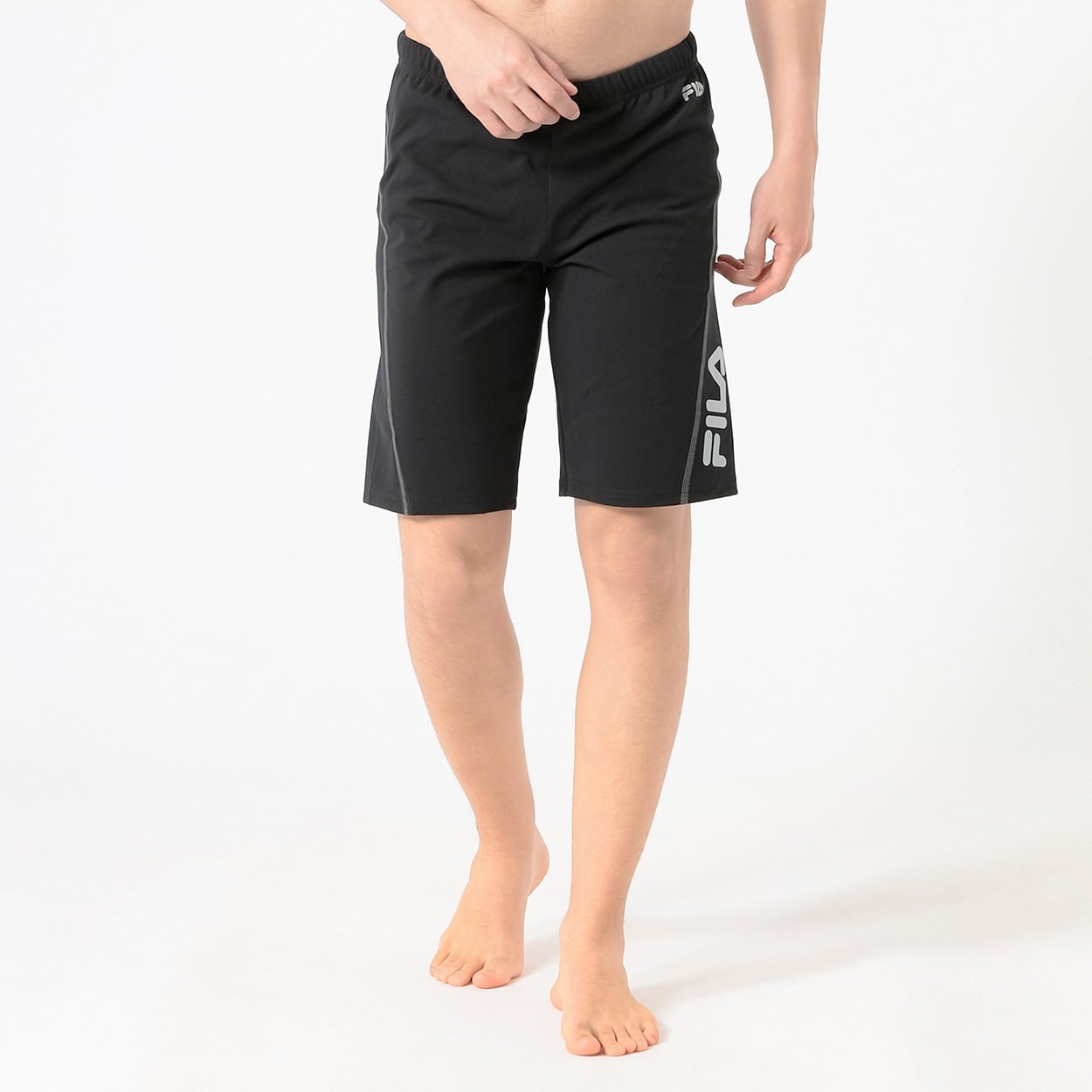 FILA(フィラ) FILA ステッチ入ルーズスパッツ メンズ(クロ-L)