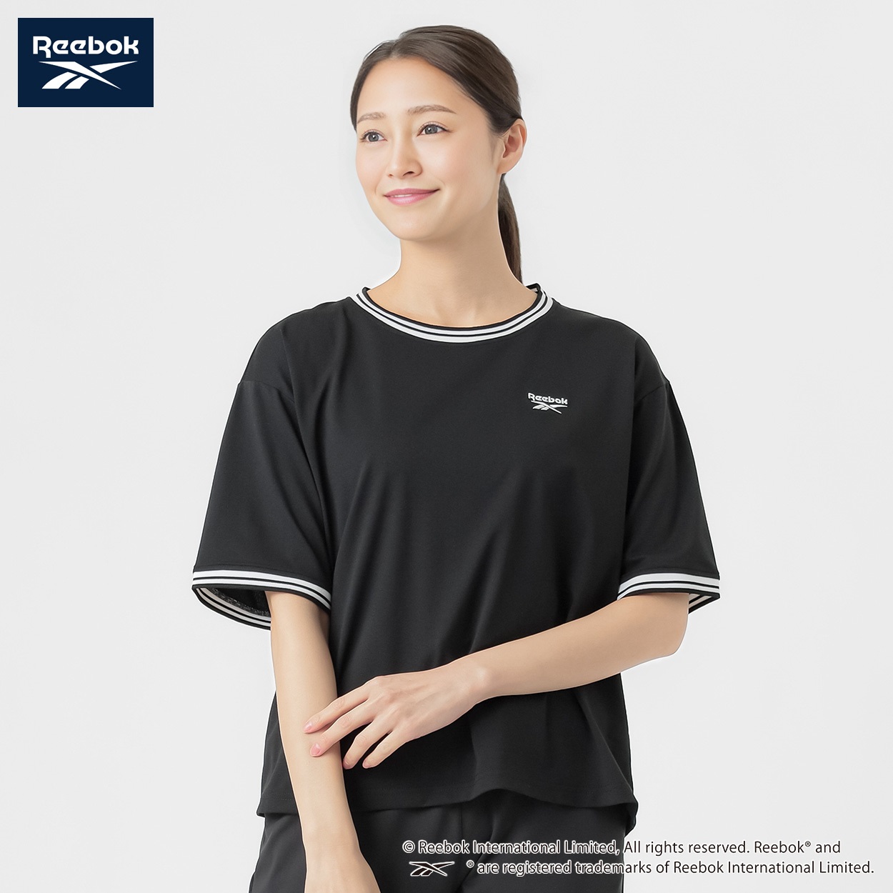 Reebok Tシャツ 肌離れのよい生地 リンガーデザイン レディス(クロ-L)