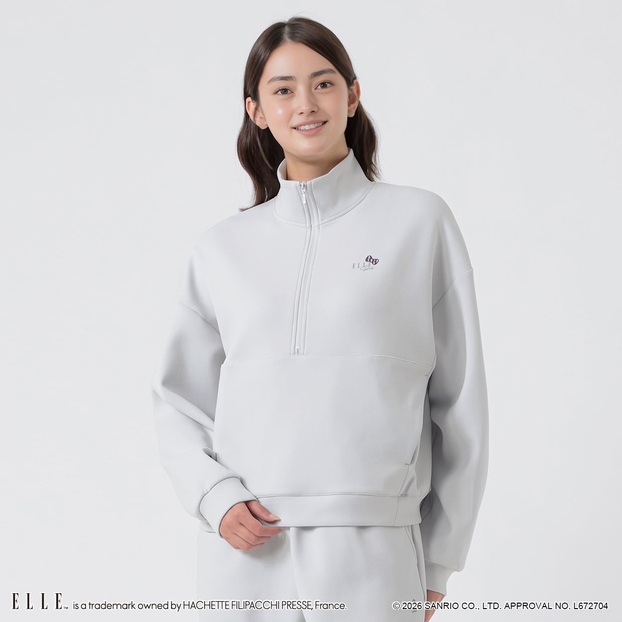 ELLE SPORT(エルスポーツ) ハローキティ×ELLE SPORT ハーフジッププルオーバー ダンボール素材 UV 吸汗速乾 レディス(ウスクロ-L)