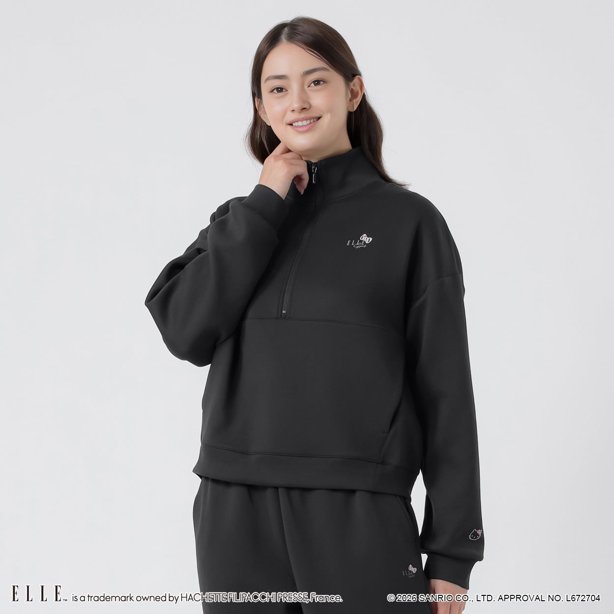 ELLE SPORT(エルスポーツ) ハローキティ×ELLE SPORT ハーフジッププルオーバー ダンボール素材 UV 吸汗速乾 レディス(クロ-S)
