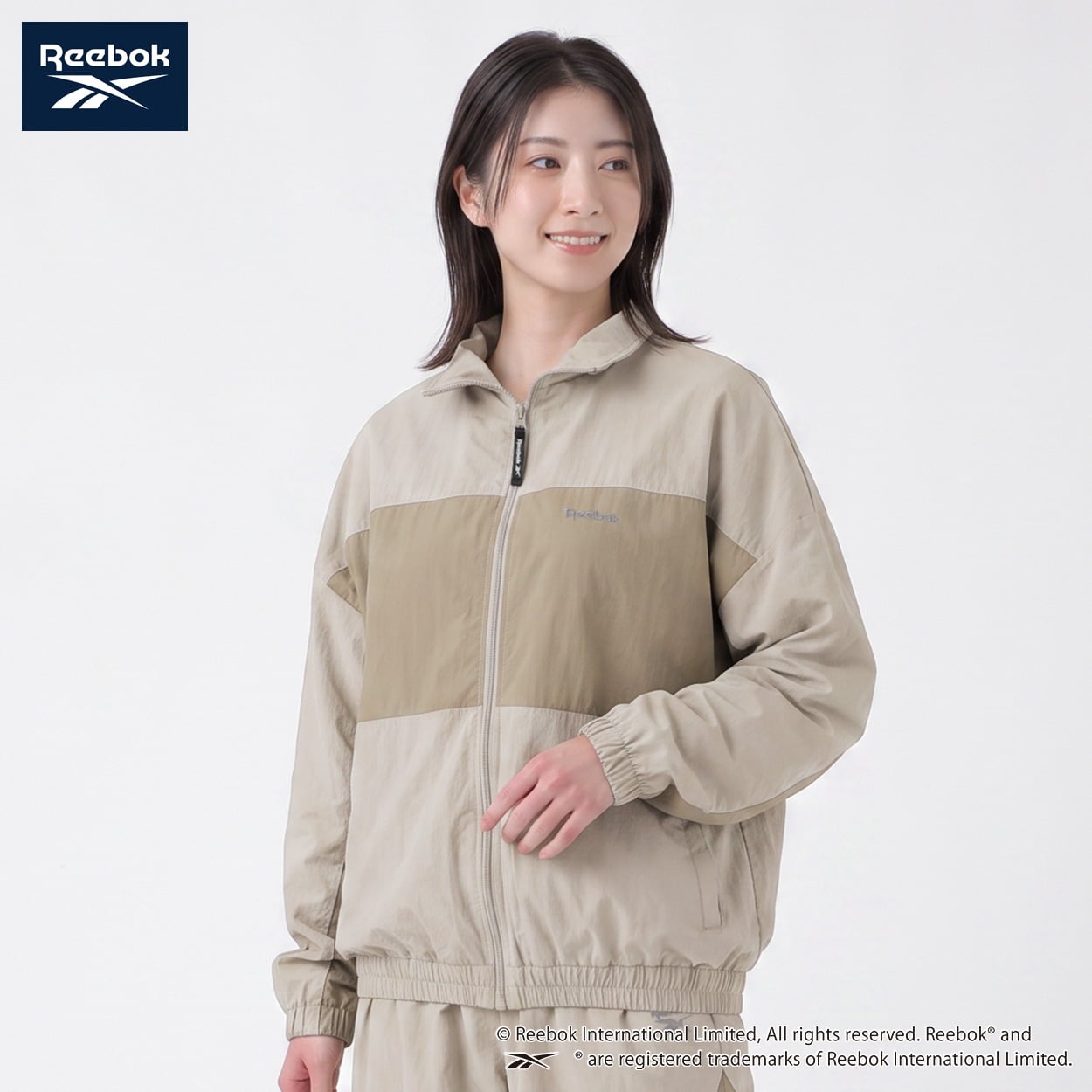 REEBOK ナイロンジャケット 裏地メッシュ レディス(アイボリー-M)