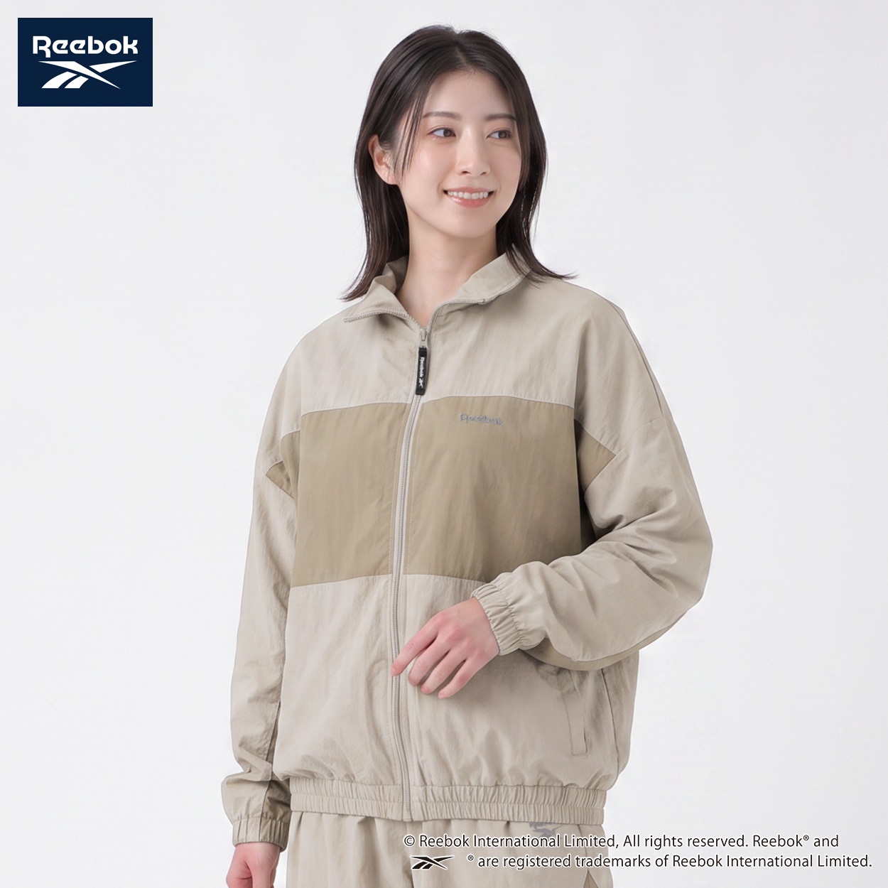 REEBOK ナイロンジャケット 裏地メッシュ レディス(アイボリー-L)