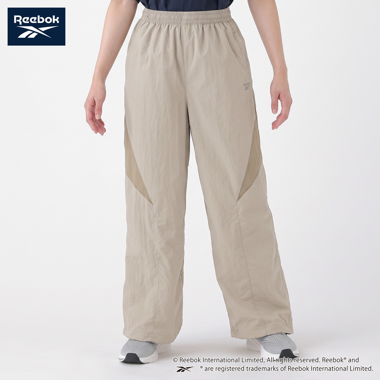 REEBOK ナイロンパンツ 裏地メッシュ レディス(アイボリー-L)