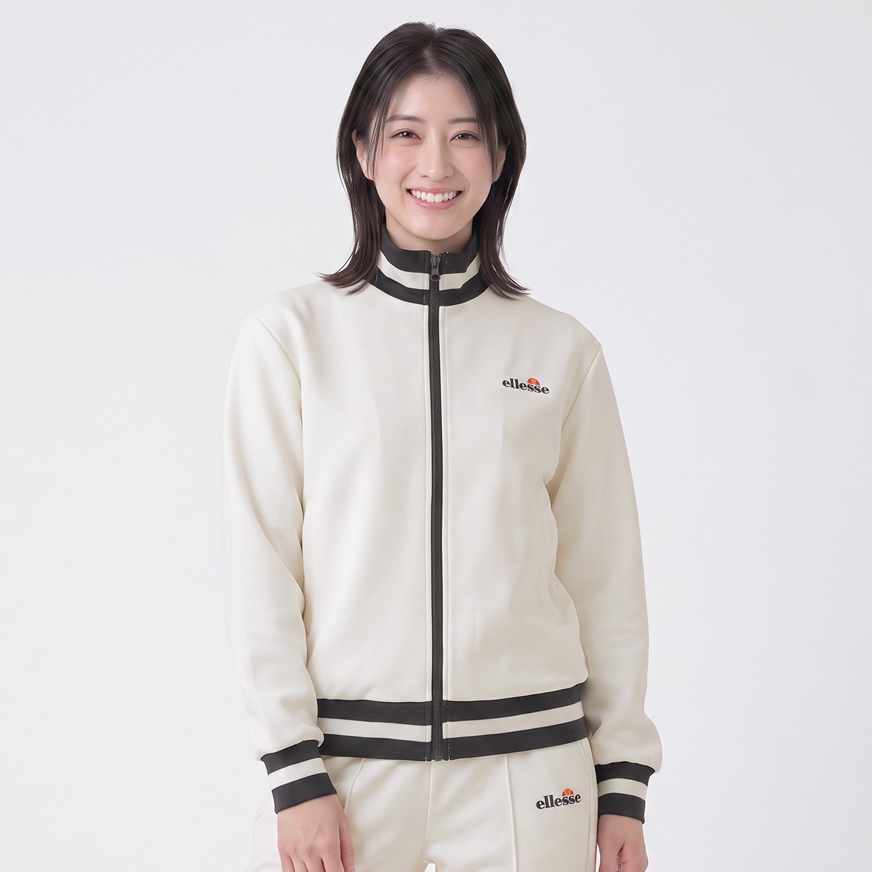ellesse ラインジャージジャケット レディス(アイボリー-L)