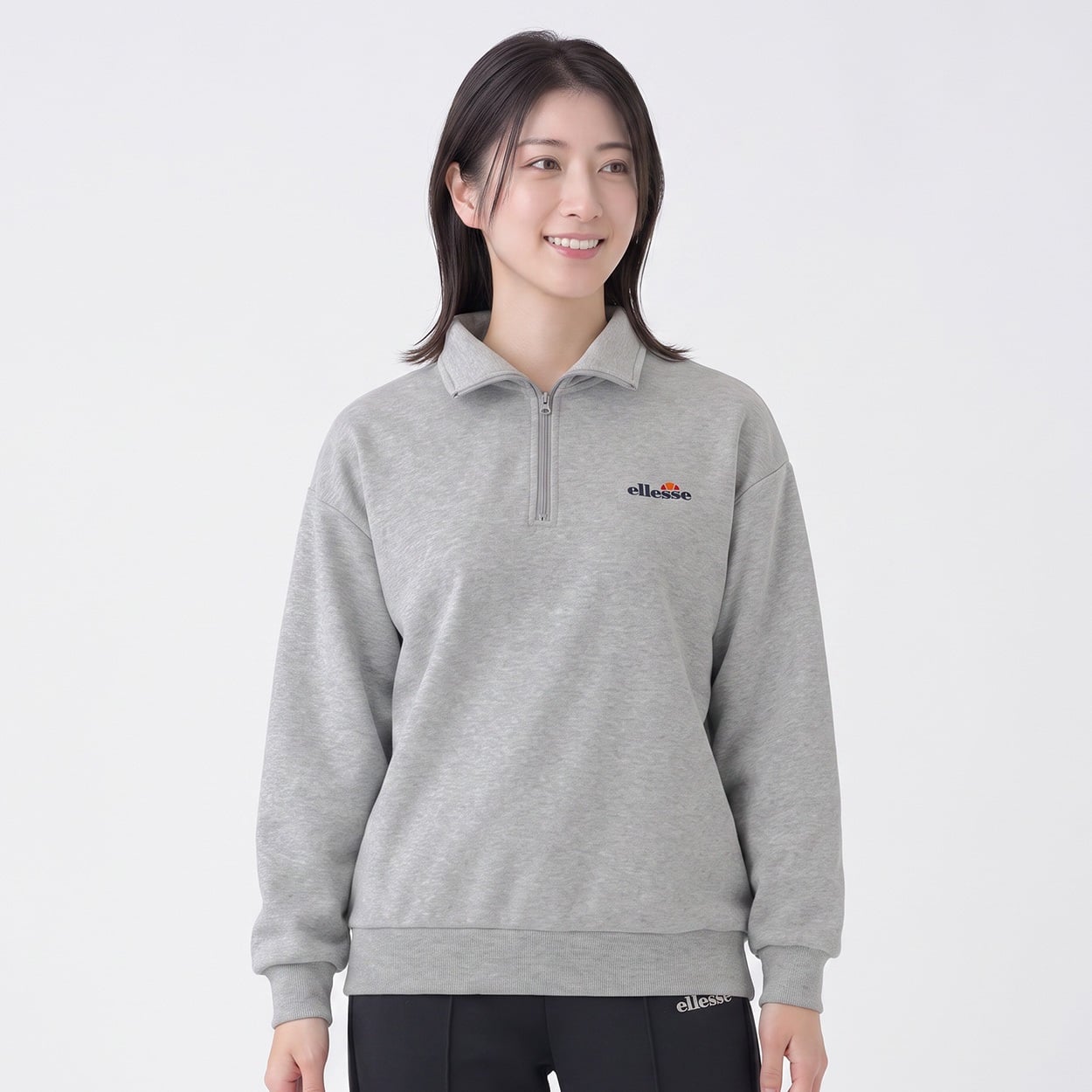 ellesse 裏起毛ハーフジップトレーナー レディス(ウスグレー-L)