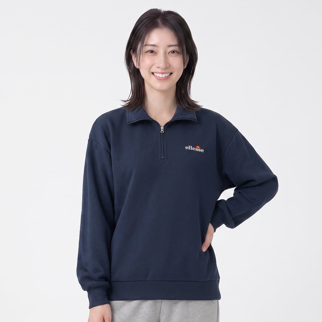 ellesse 裏起毛ハーフジップトレーナー レディス(コイアオ-M)
