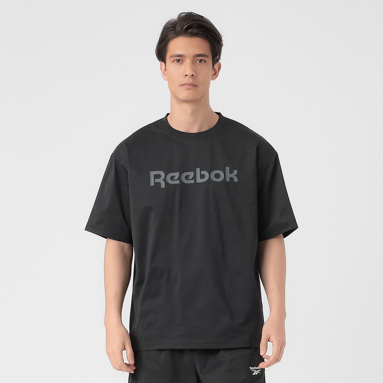 Reebok綿タッチ天竺プリントTシャツ メンズ(クロ-XL)